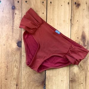 Aerie bathing suit bottom hip hugger style, size medium, vibrant rust color.